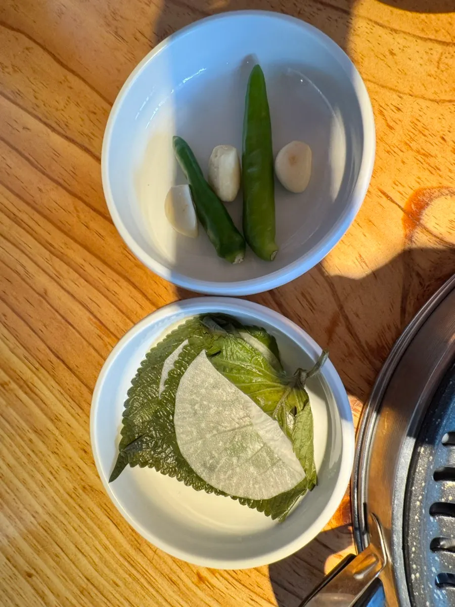 Baek kimchi and perilla leaf pickled radish side dishes