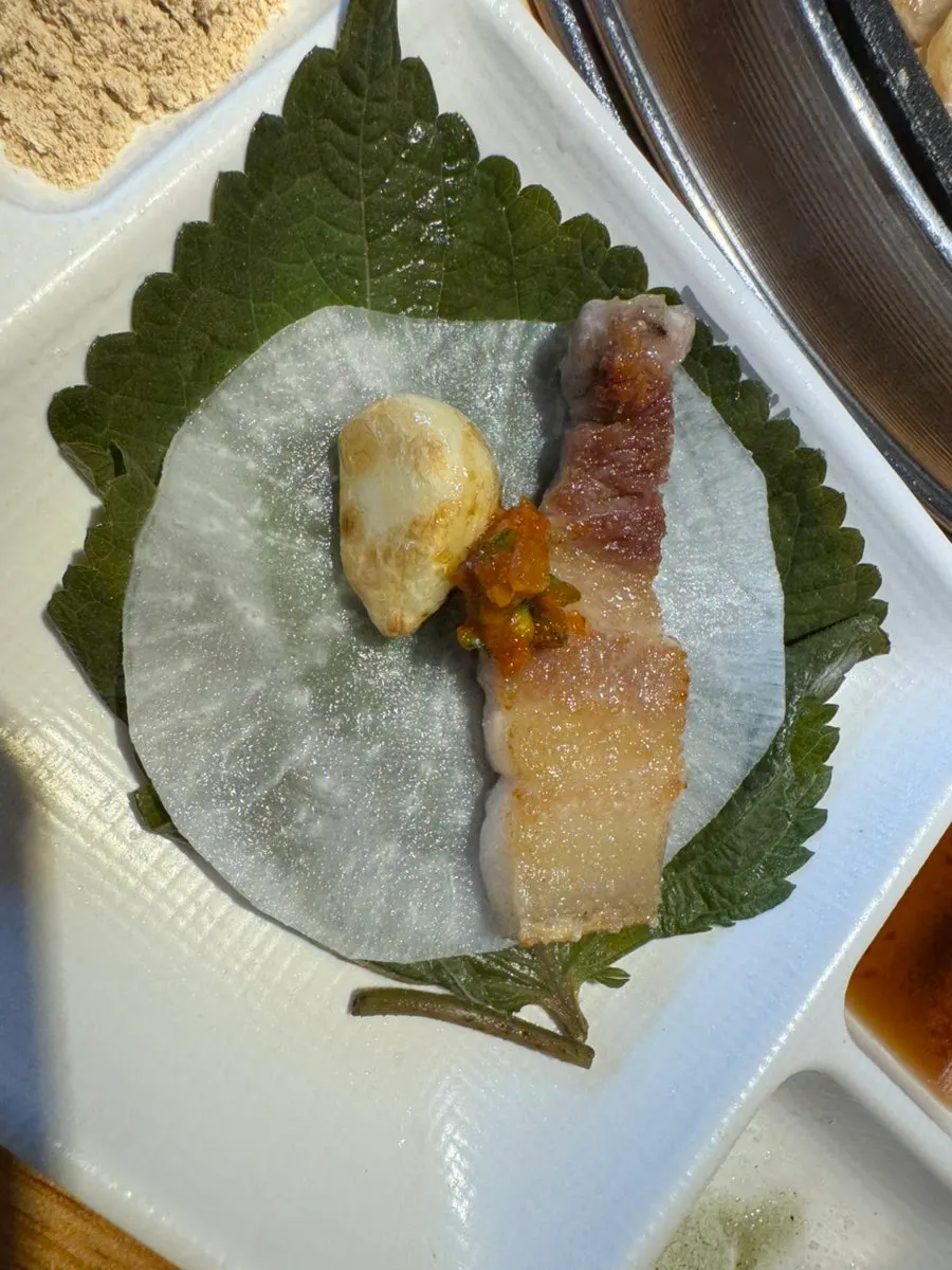 Fully grilled salted ogyeopsal on the grill
