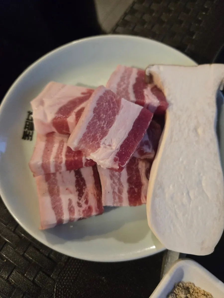 Raw salted pork belly and dwitgogi before cooking