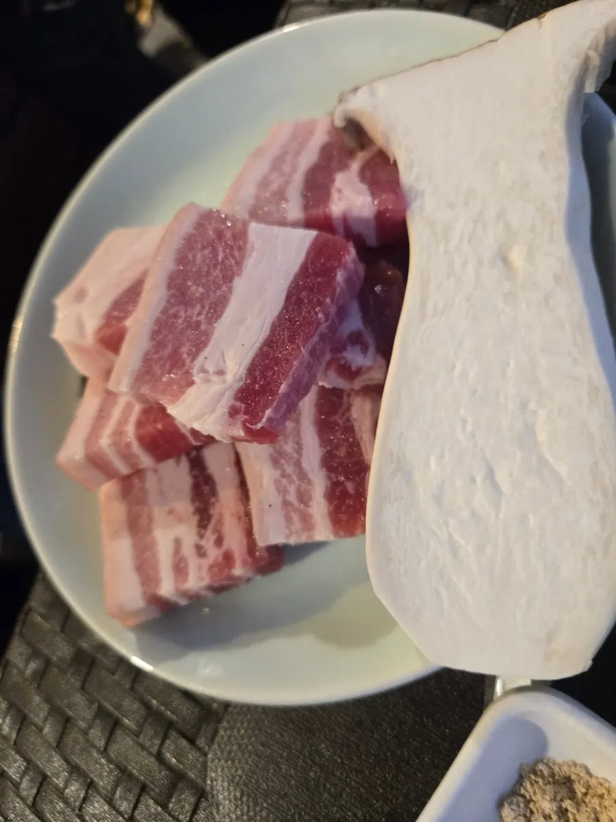 Grilled pork skin served already cut into pieces