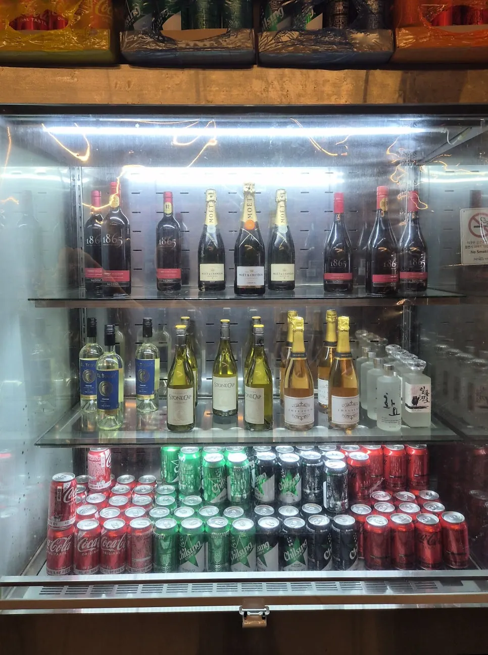 Drink lineup including soju, beer and wine