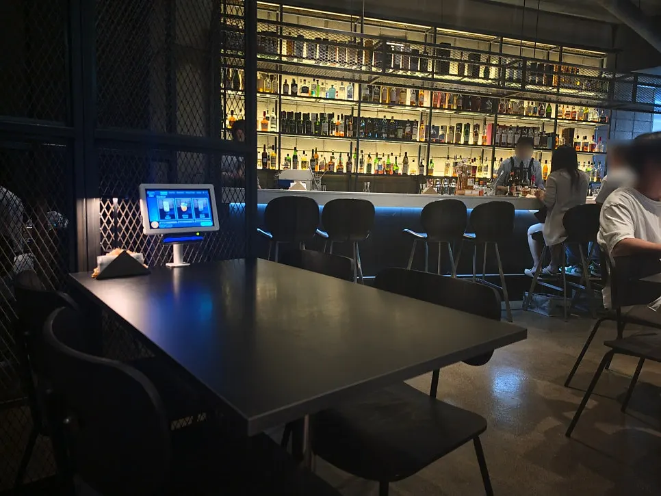 Comfortable table seating atmosphere at Bitters
