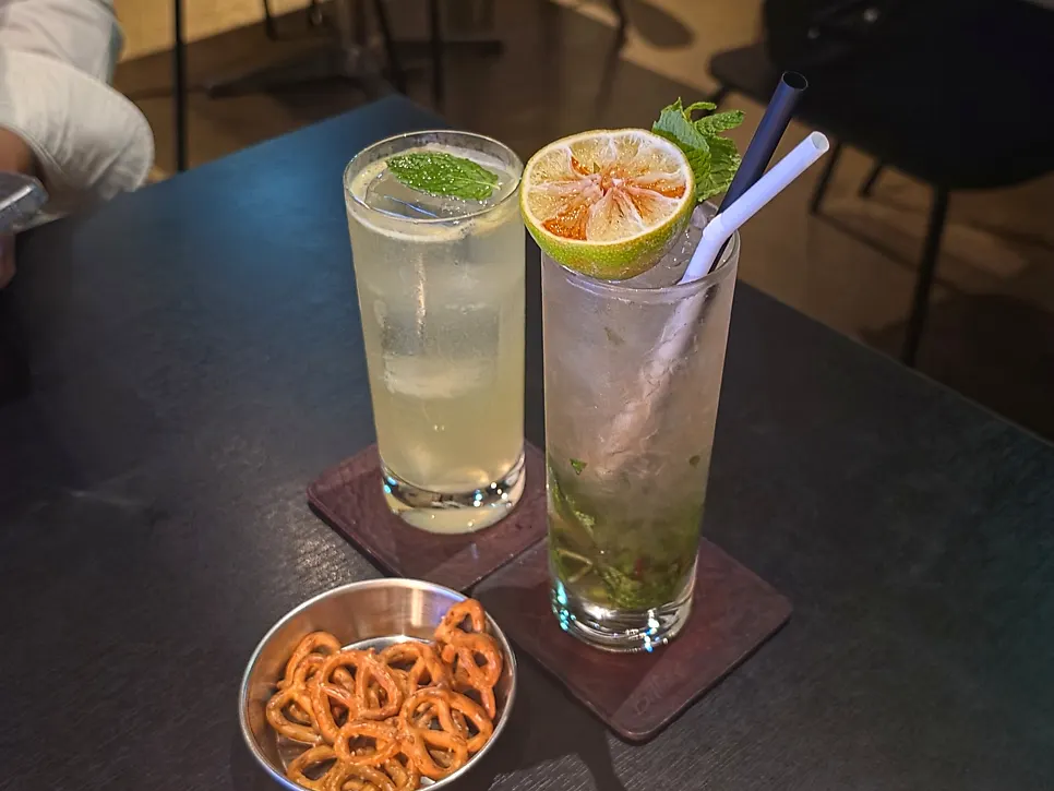 Pretzels and glasses set on the table