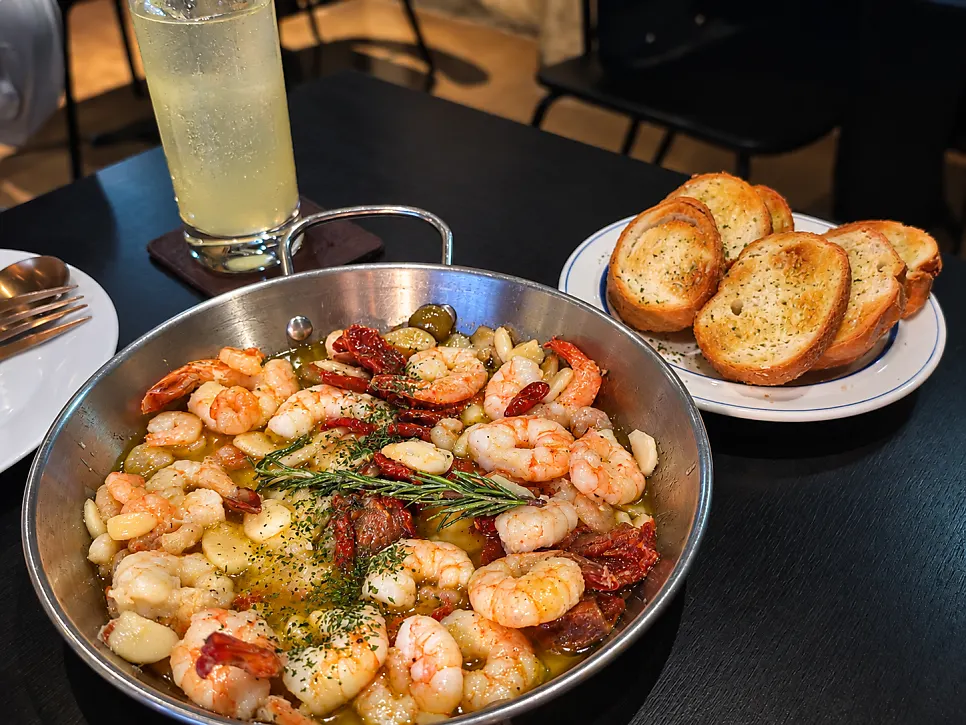 A pan of gambas, Bitters' side dish