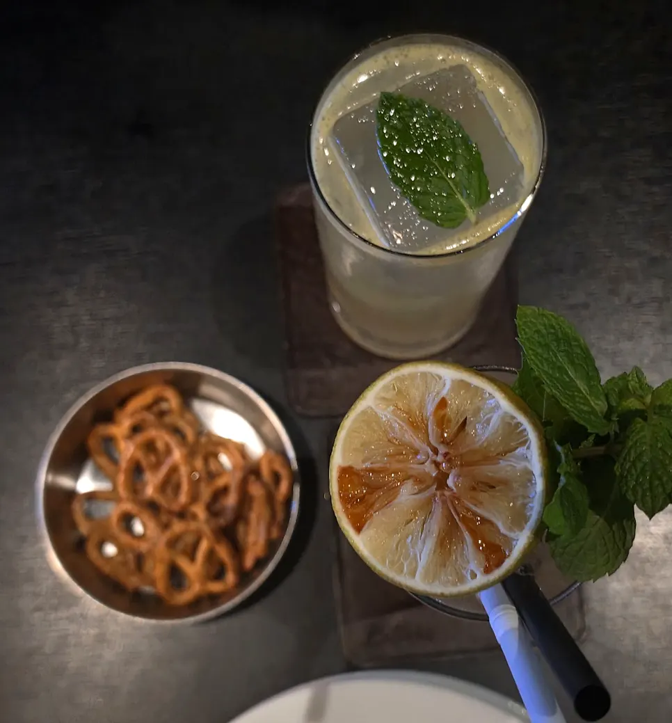 Cocktails and gambas laid out on the Bitters table