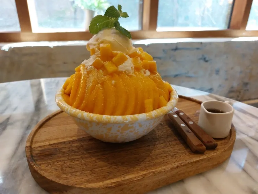 A spoonful of the peach bingsu