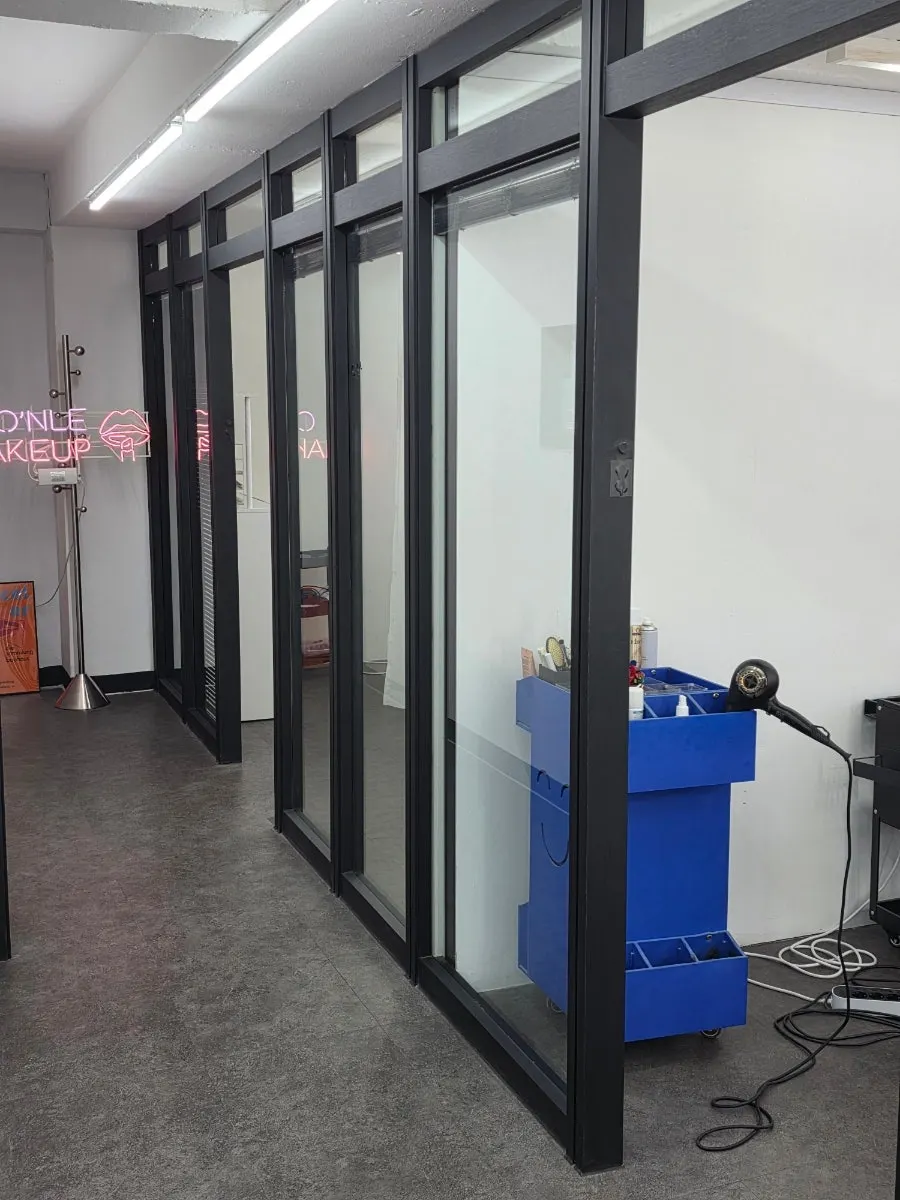 Makeup room with a sofa for a companion to wait