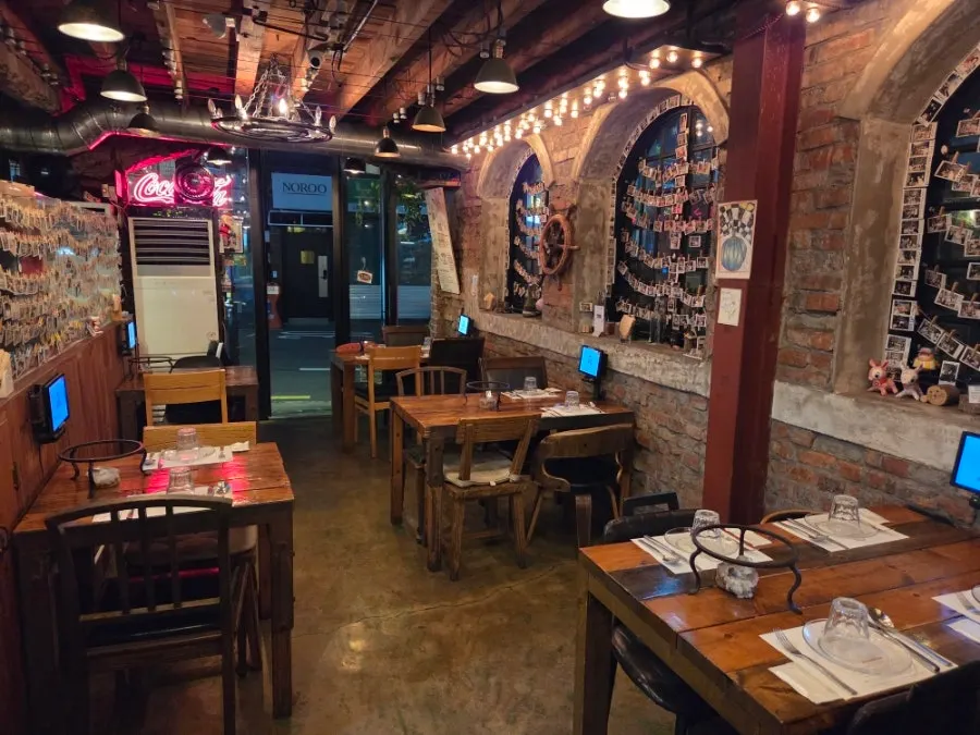 View of the restaurant near the kitchen and oven area