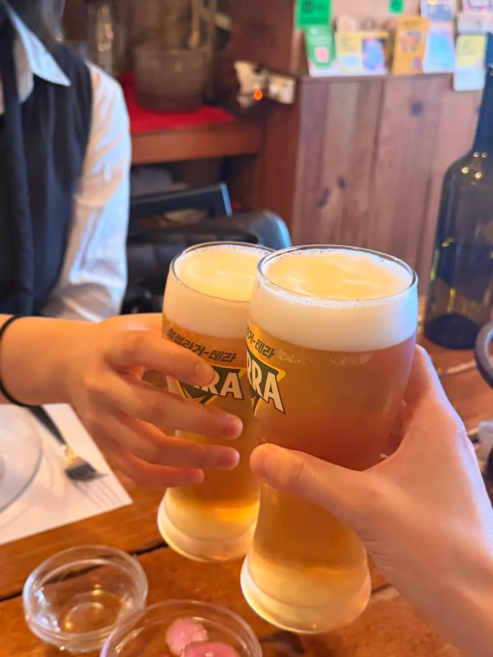 A glass of draft beer with fine foam