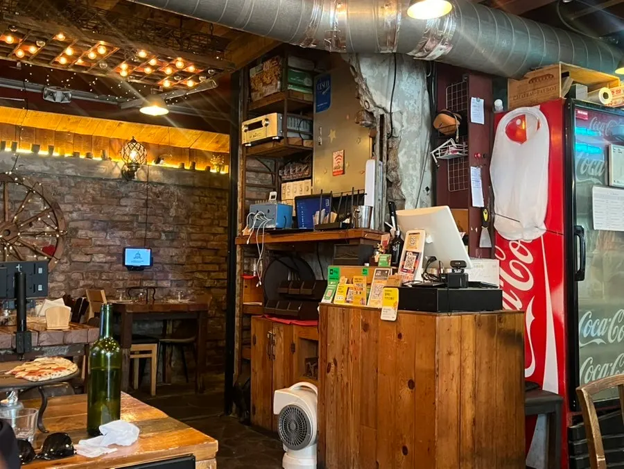 Cozy seating area at Hongdae Hwadeok Pizza