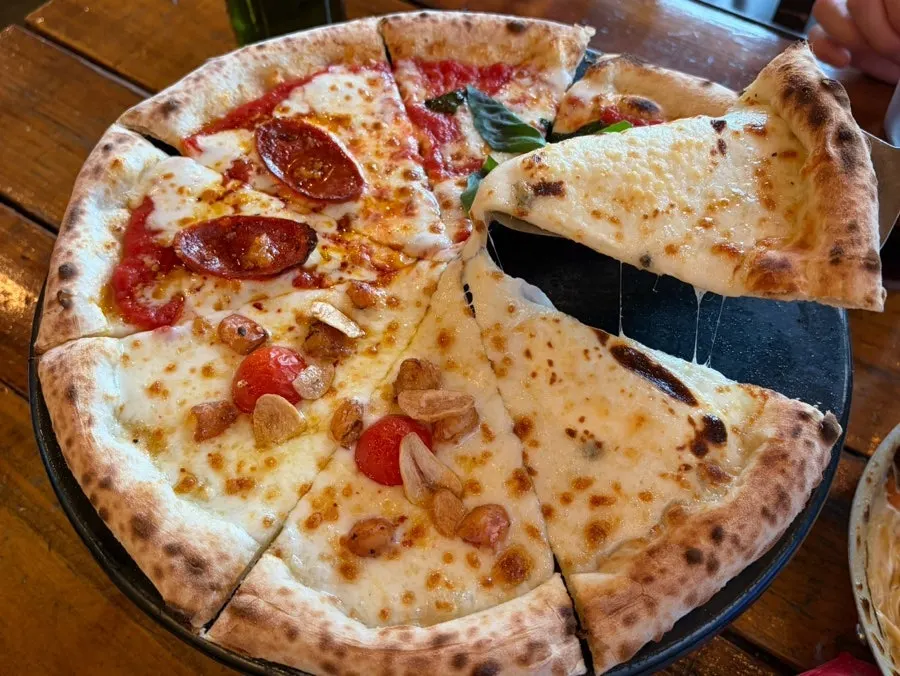 Close-up of the golden, puffed pizza crust