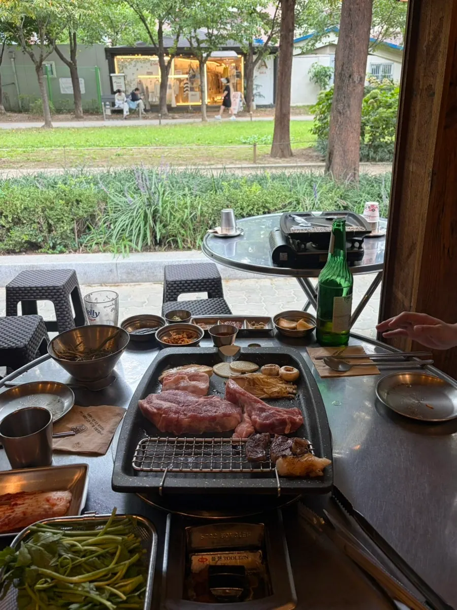 BBQ spread on the outdoor terrace by Gyeongui Line Forest Park