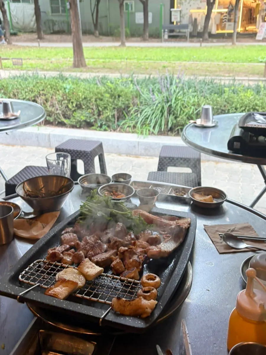 Grill topped with minari and kimchi