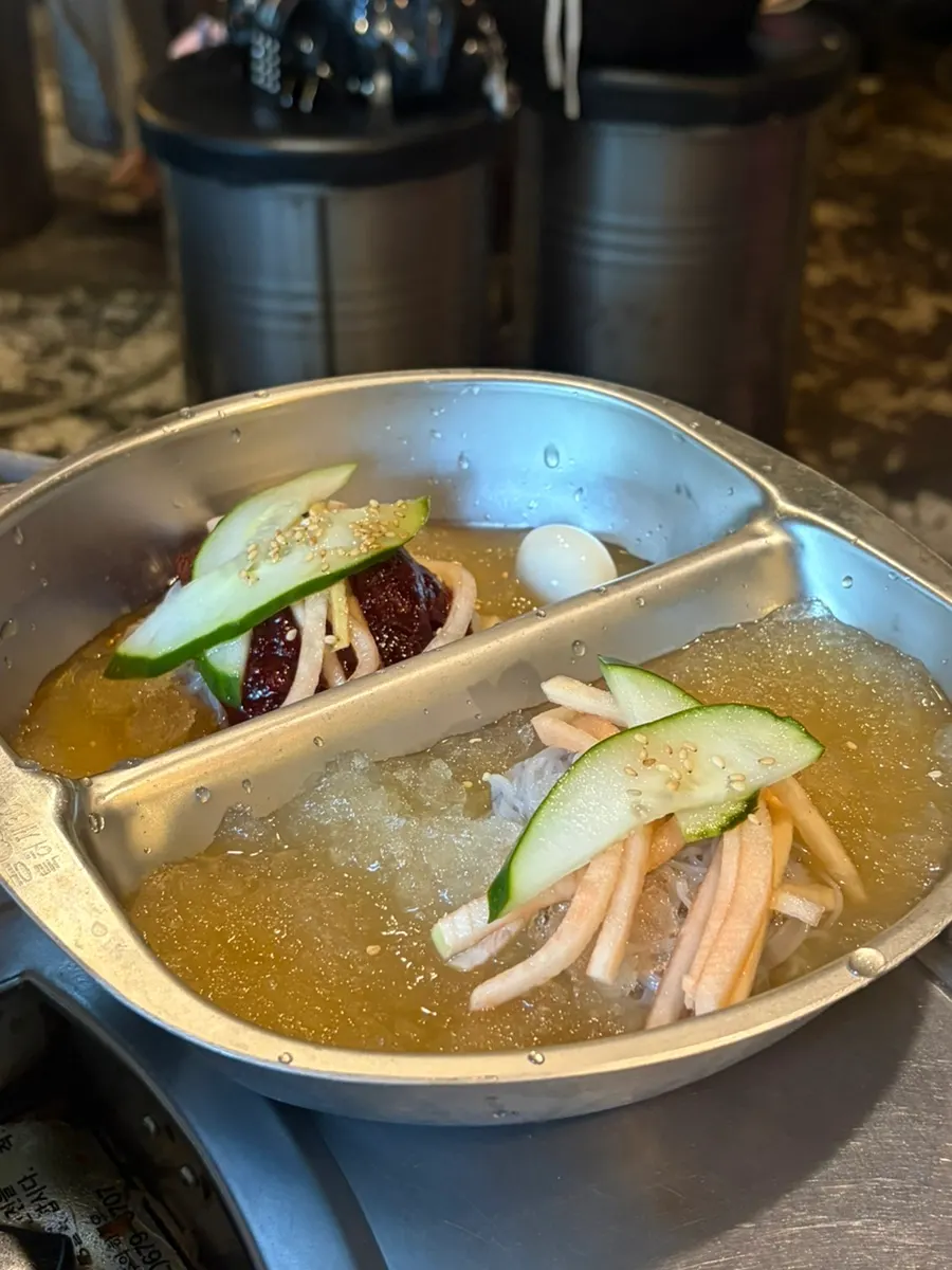 A bowl of thin-noodle half-and-half naengmyeon