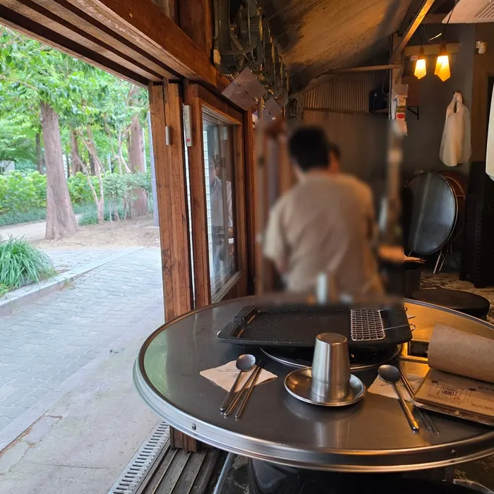 View across the dining room with tables for two