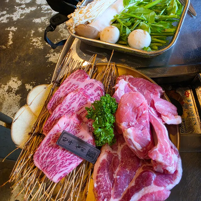 Hanwoo beef skirt steak with thick pork neck and short rib on the table
