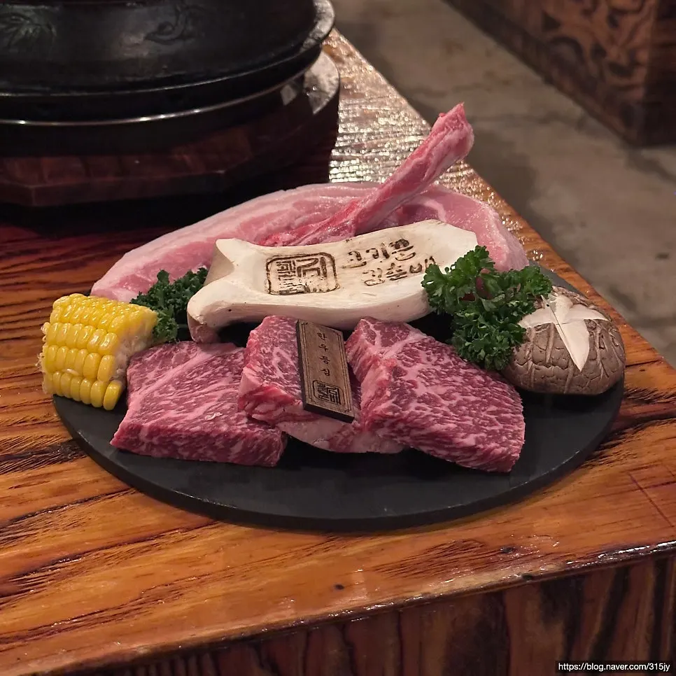 Hanwoo beef grilling on the grill plate