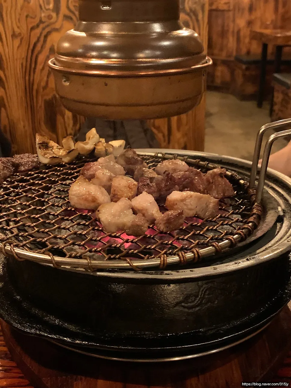 A piece of meat paired with myeoljeot and myeolnamul