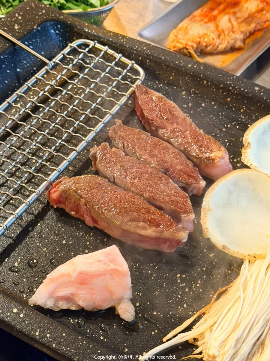 Table set with the two-person meat set and side dishes