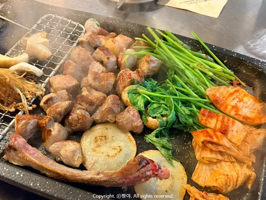 Close-up of meat grilled by the staff