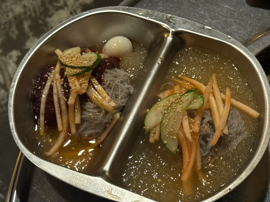 Half-and-half naengmyeon with mul naengmyeon and bibim naengmyeon