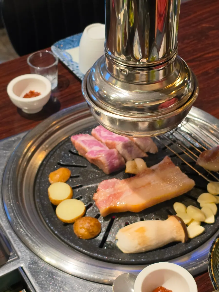 A piece of meat served with wasabi