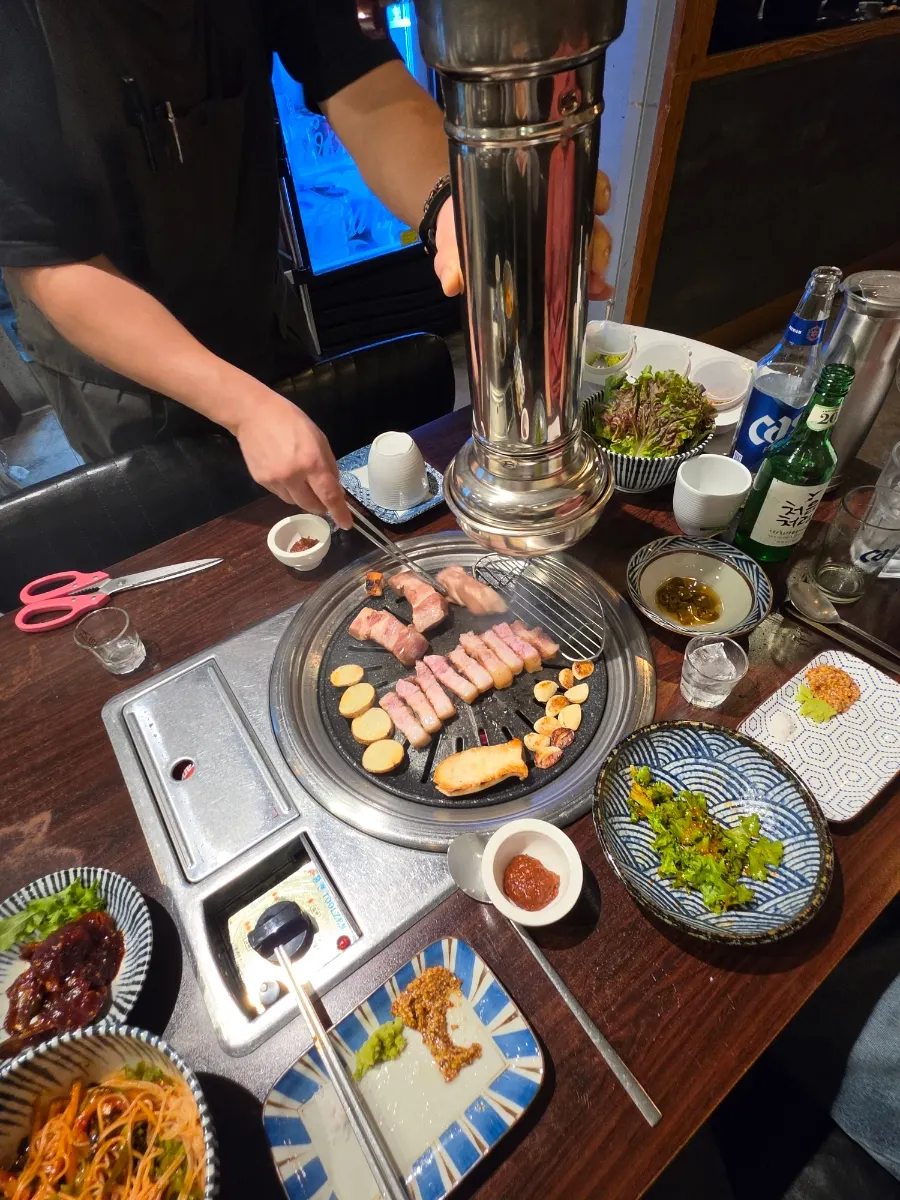 Grilling the extra meat that was ordered