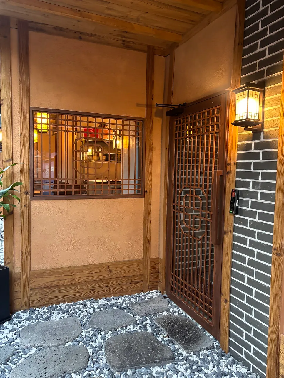 Spacious waiting area inside the hanok gate