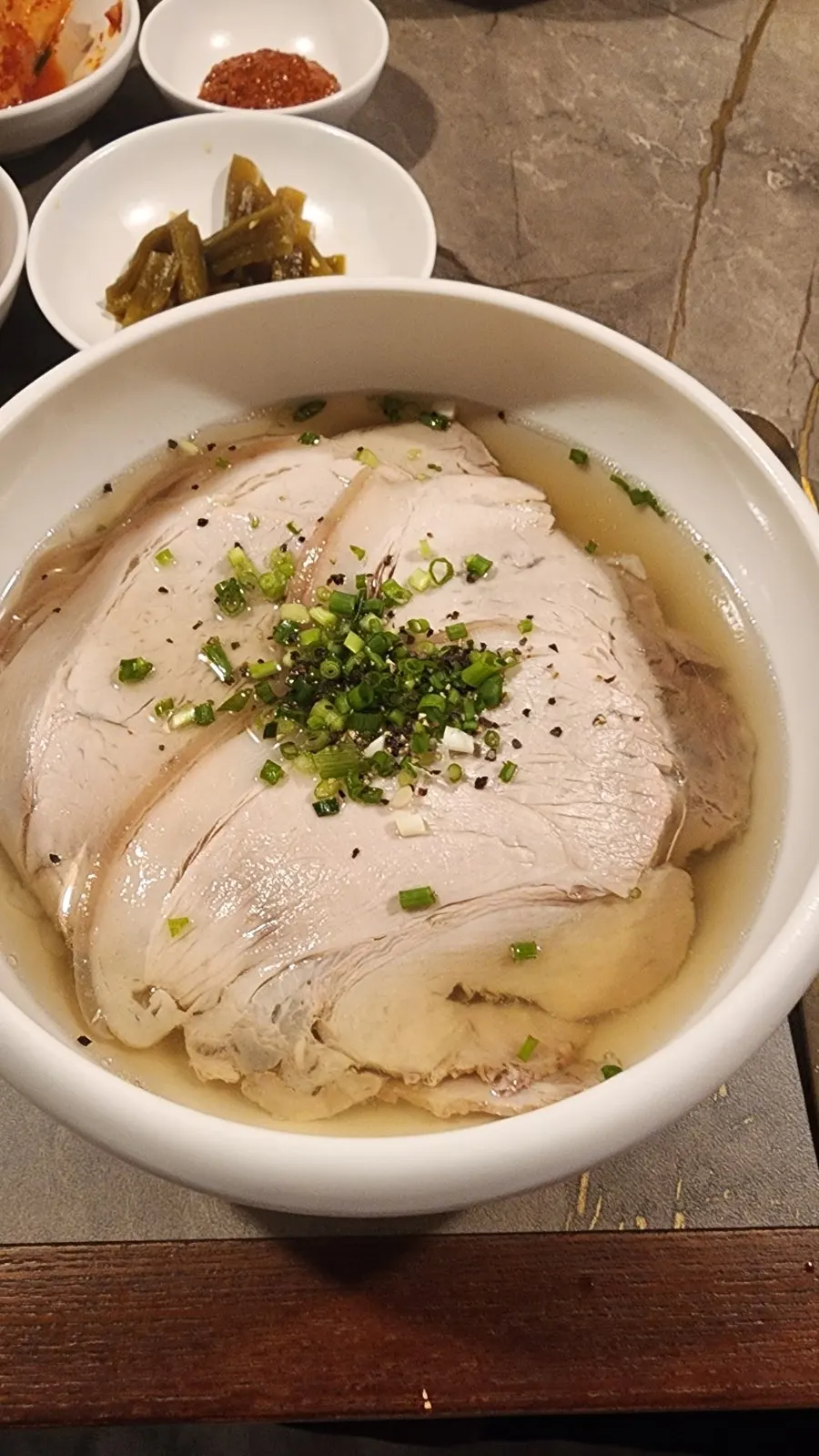 Pyongyang naengmyeon with generous Korean pork topping
