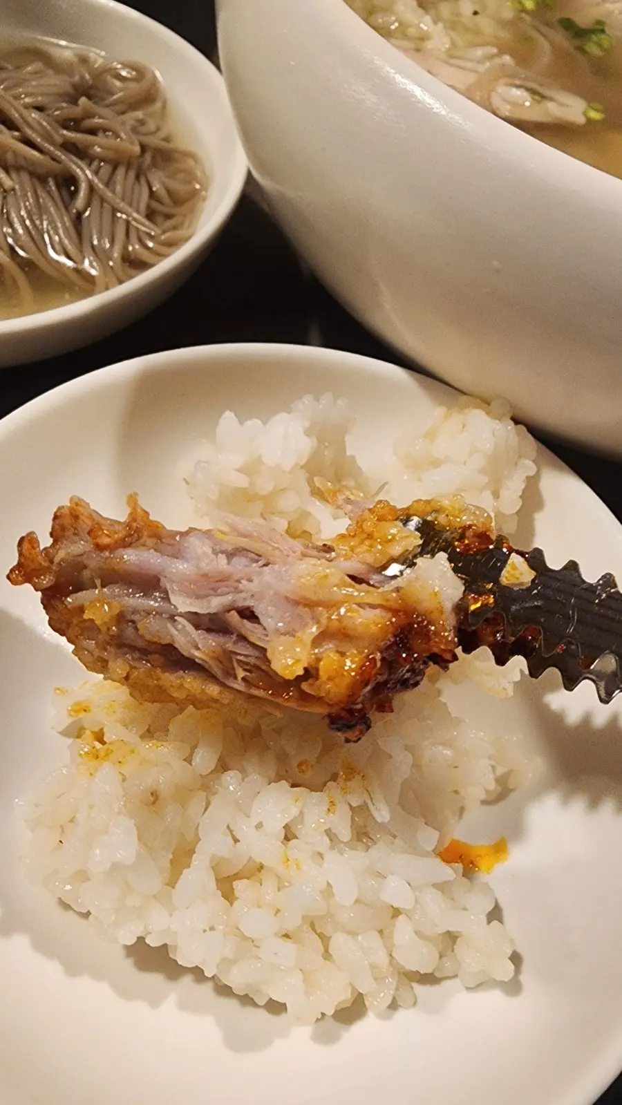 Braised pork tail in a smoky sauce