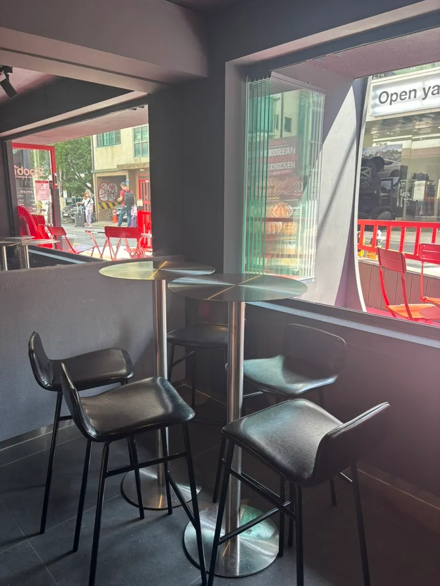 Wide view of the breezy first-floor bar seating