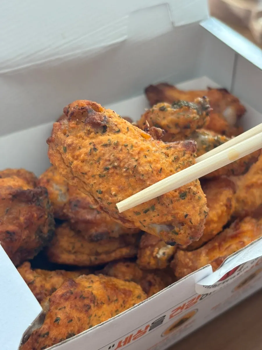 Close-up of an evenly grilled wing piece
