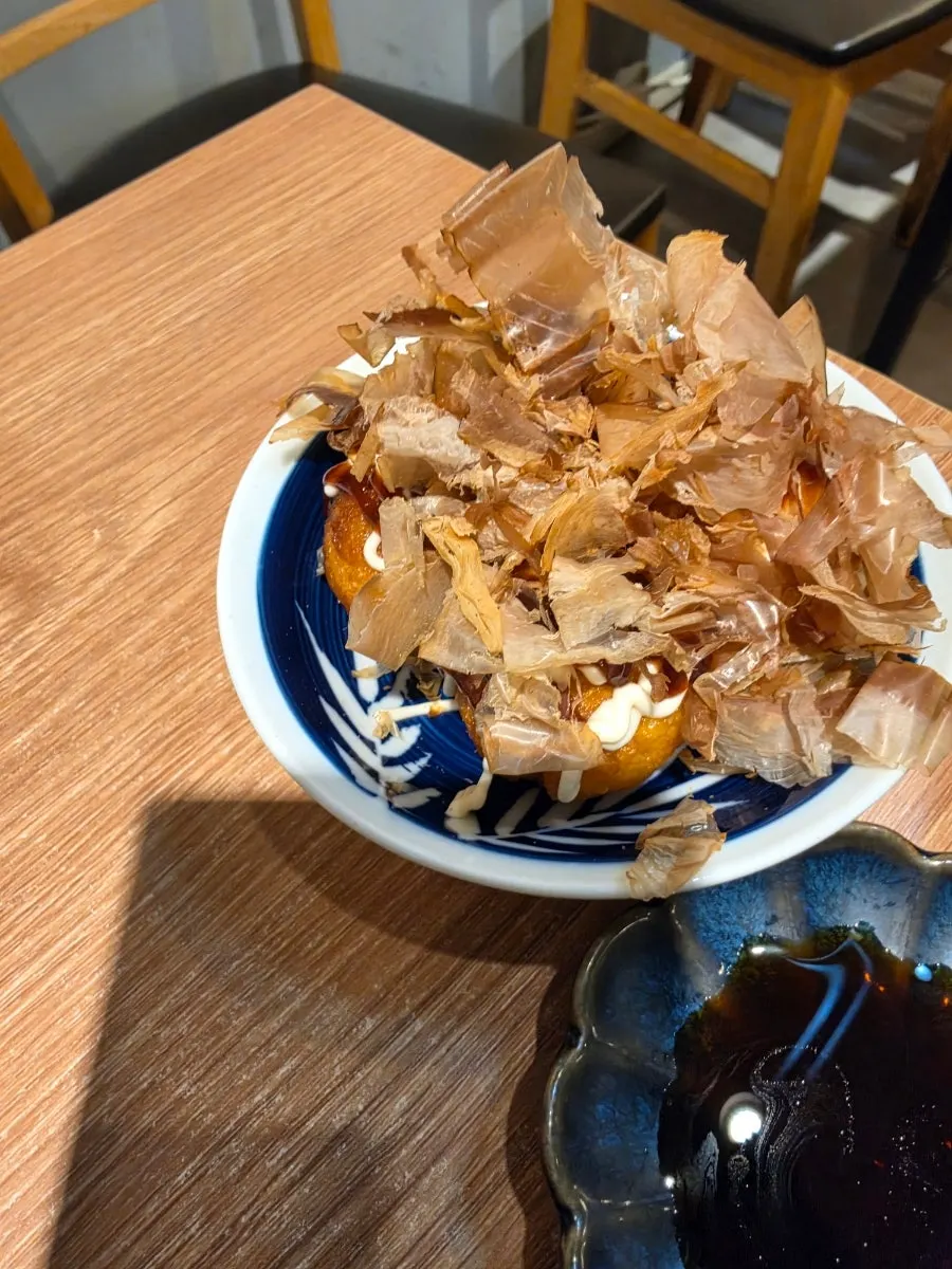 Tako-yaki served as a complimentary item