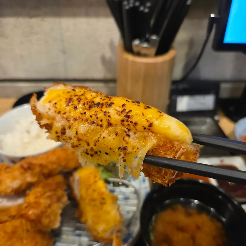 Plate of mixed katsu with pork loin, shrimp, and cheese