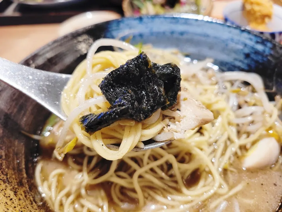 Ramen toppings with chashu pork and a soft-boiled egg