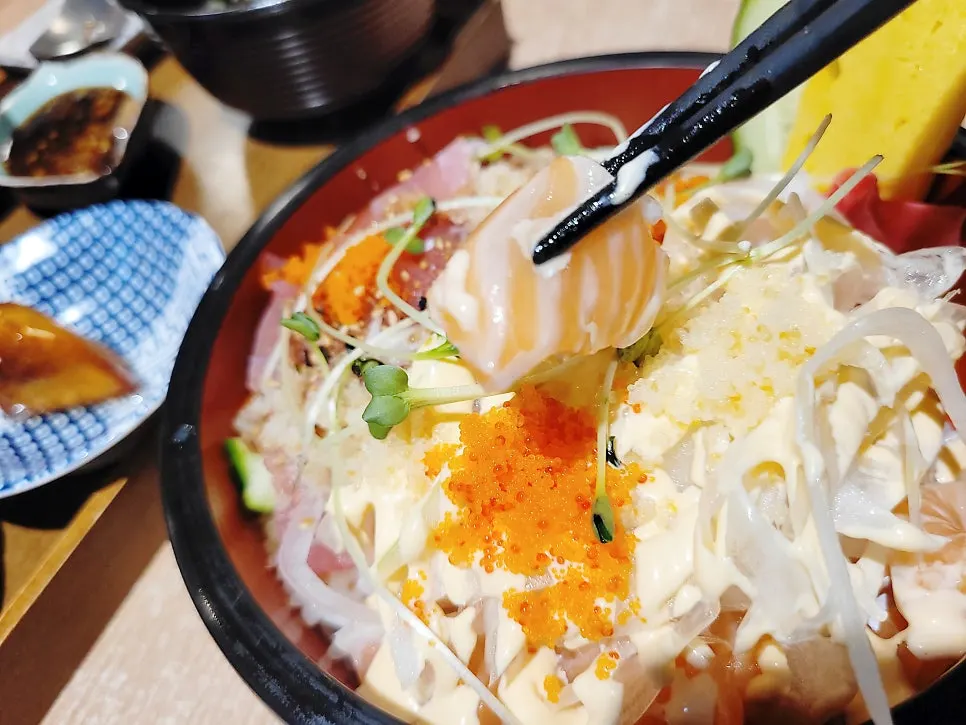 Close-up of the soft salmon in the sushi bowl