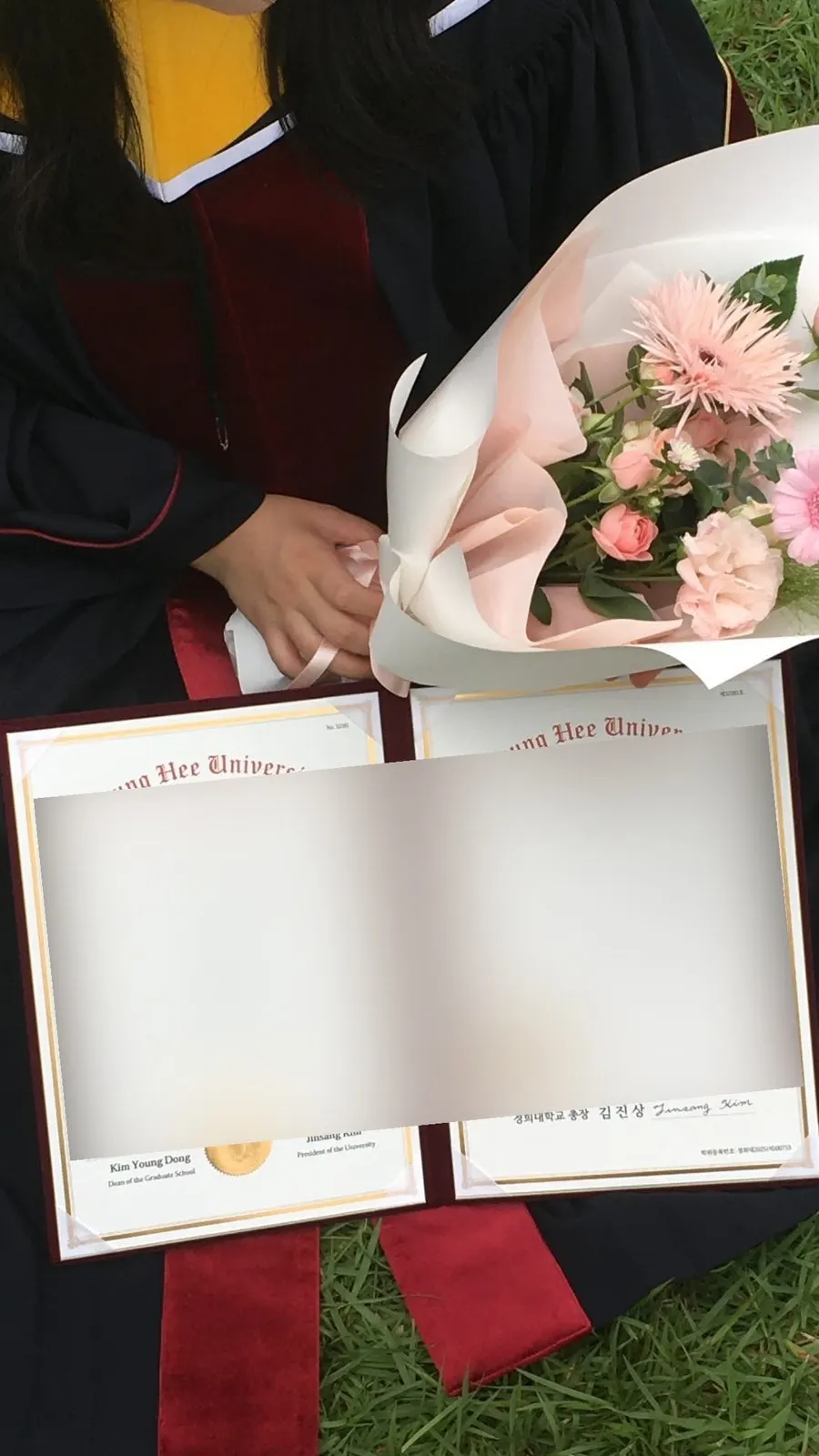 Full-length photo taken at the graduation ceremony