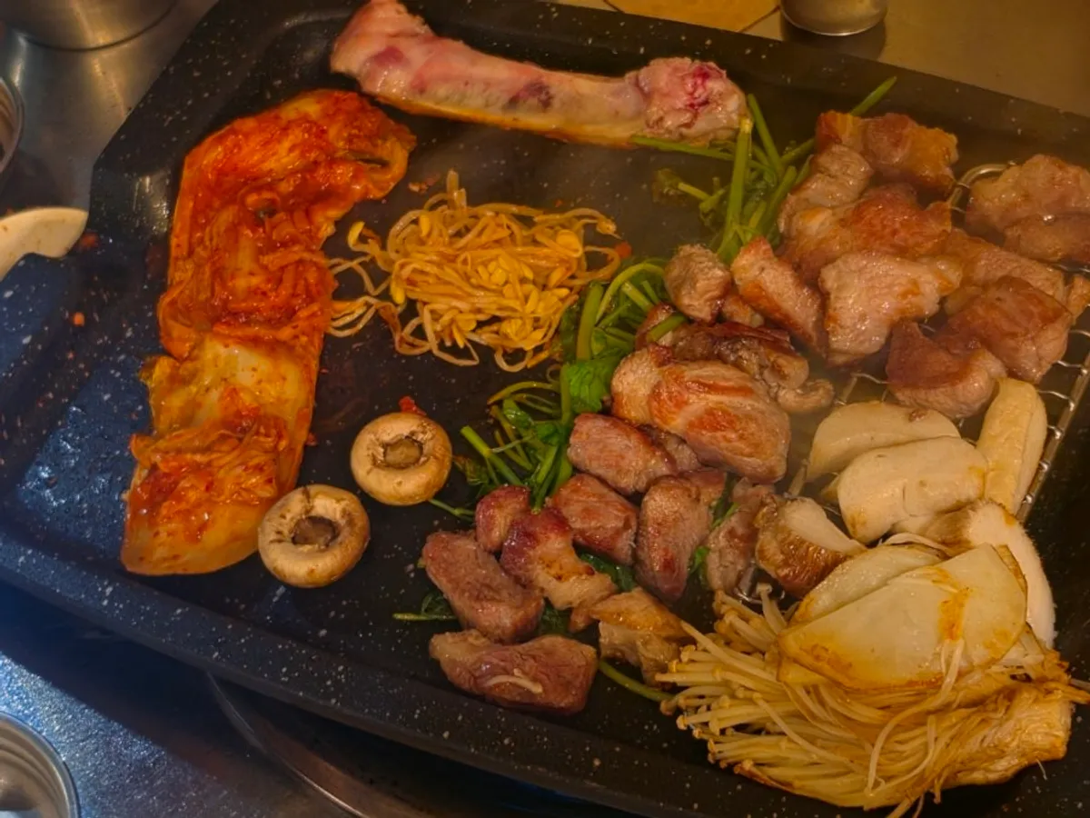 Exterior of Gogikkun Gimchunbae Hongdae Supgil Branch, a Hongdae Korean BBQ restaurant beside Gyeongui Line Forest Park
