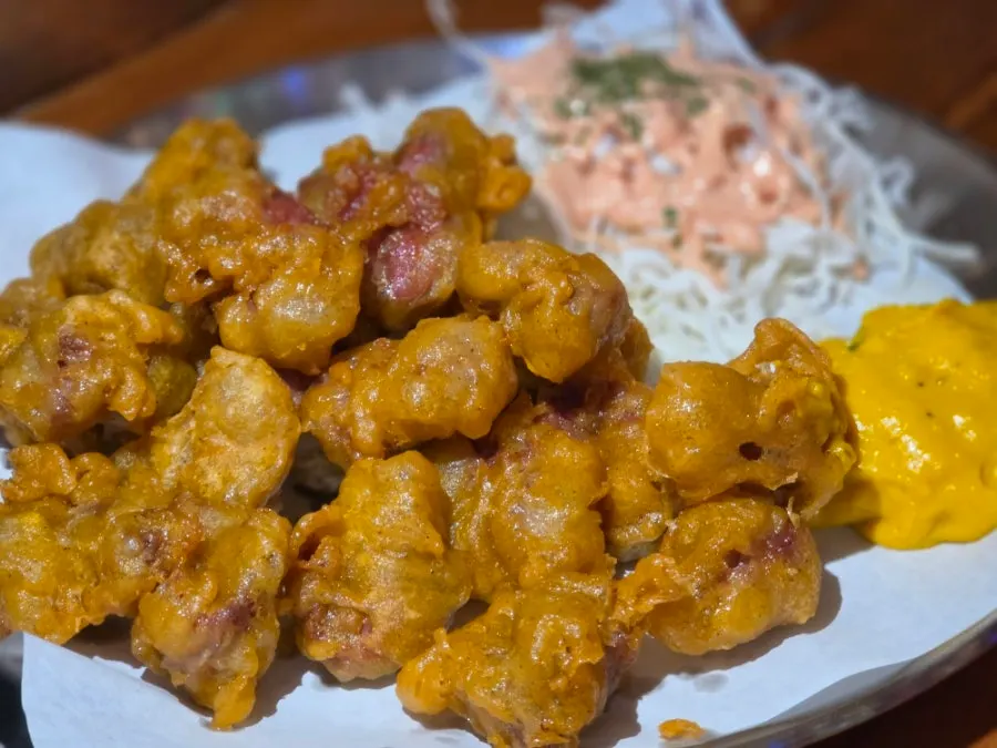 Steaming hot fried chicken gizzards