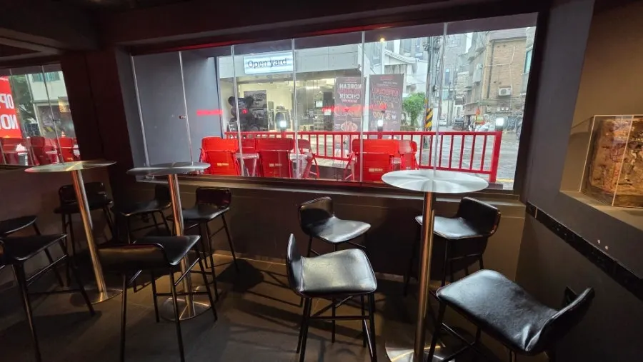 Interior of Goobne Chicken Hongdae Red Road spanning the 1st and 2nd floors