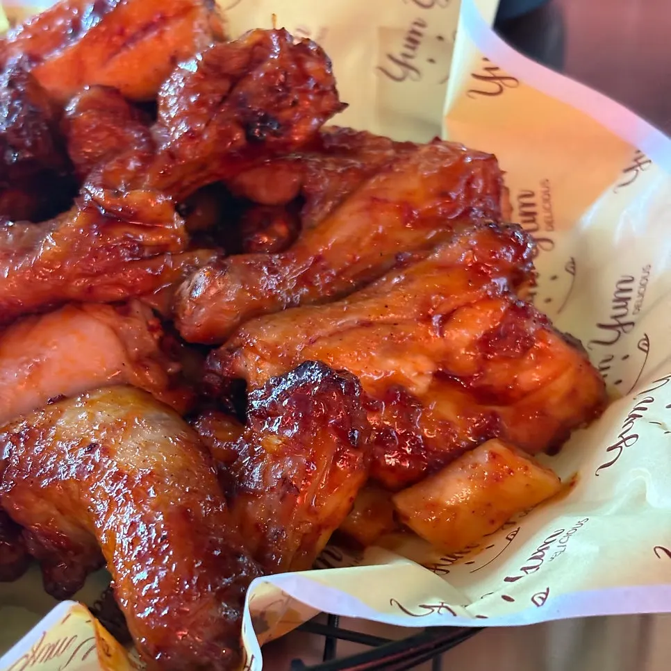 Close-up of pa-gireum tteokbokki chicken topped with rice cake