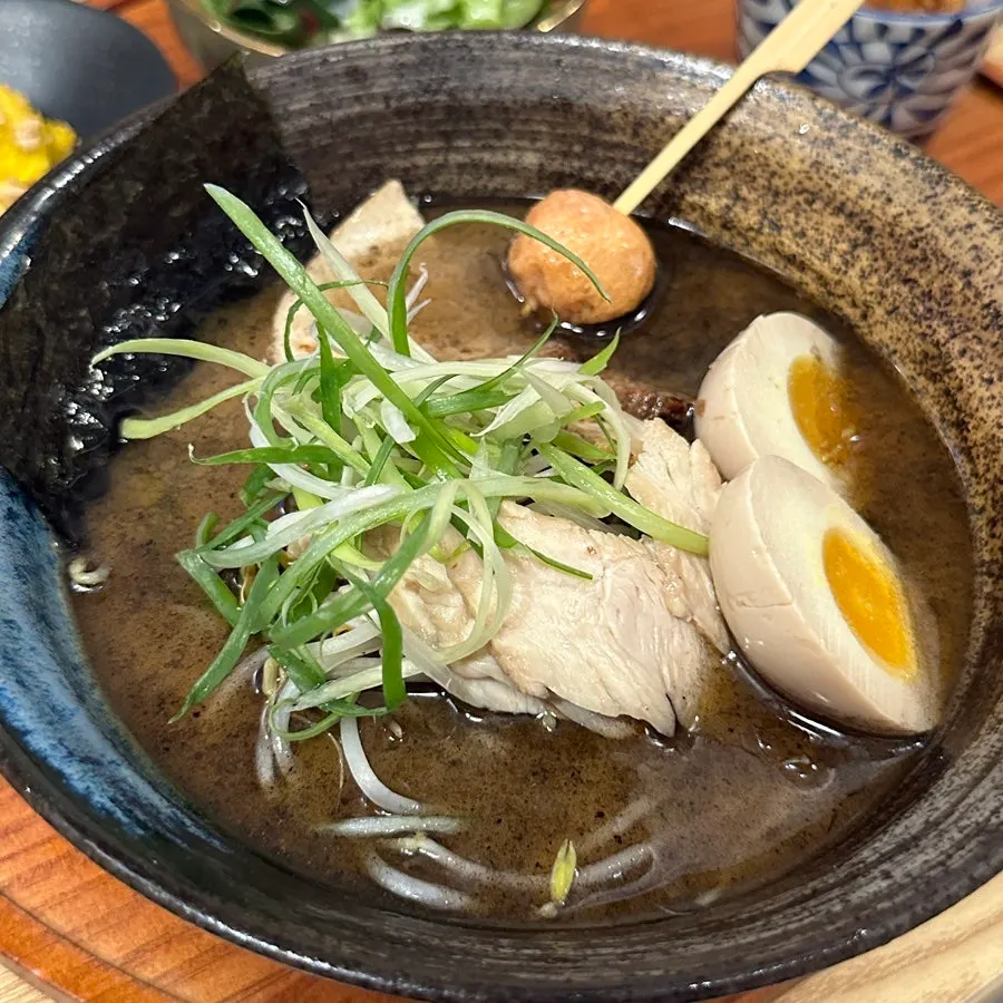 Tonkotsu ramen topped with black garlic sauce