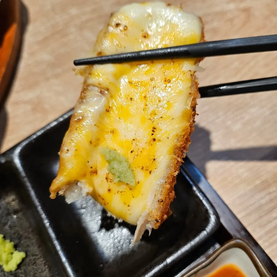 Close-up of the crispy fried cheese katsu