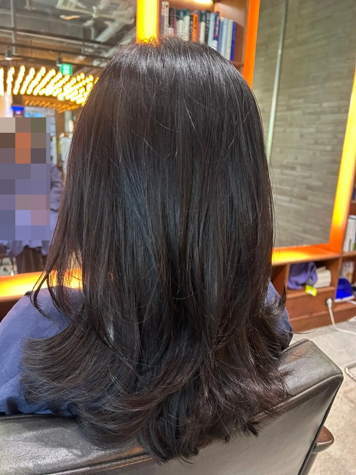 Shiny hair after the finishing blow-dry