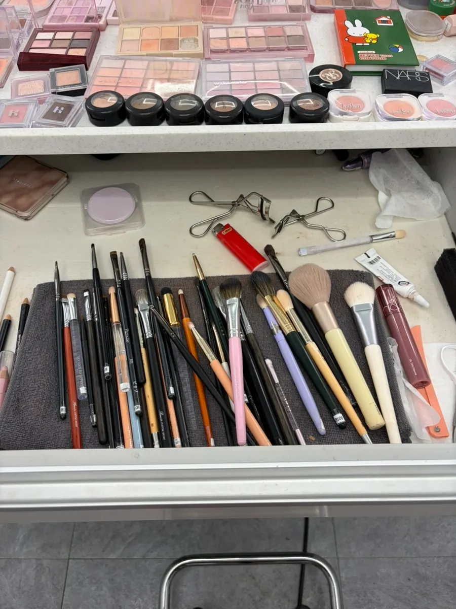 Various palettes laid out on the makeup table