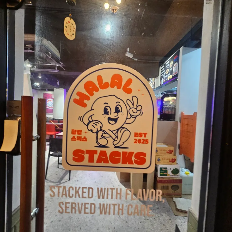 Character sign at the entrance of Halal Steaks