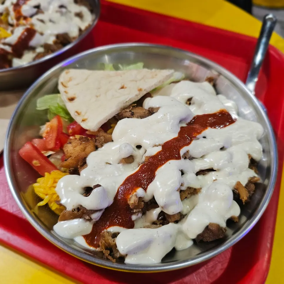 Platter with the two sauces mixed together, colors blended
