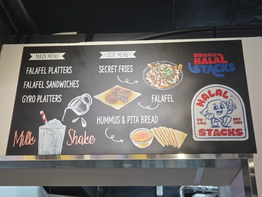 Menu and food photos displayed inside the restaurant