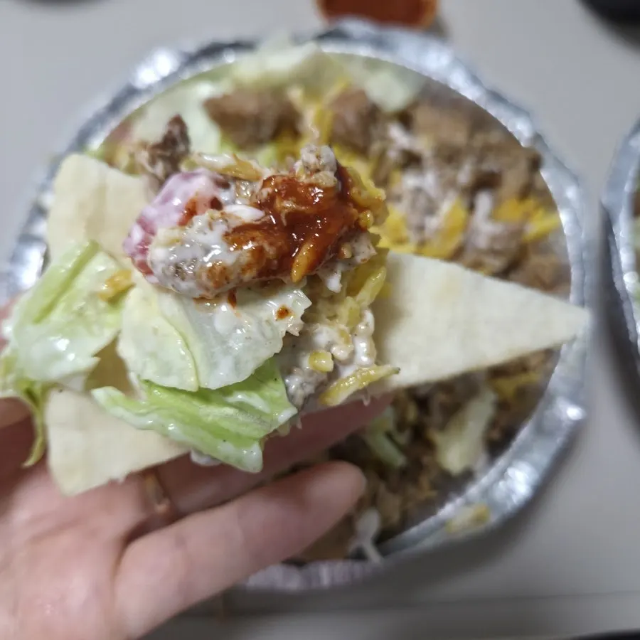 Chicken Platter eaten on top of pita bread