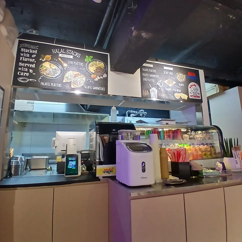 Menu board and ordering area at Halal Steaks